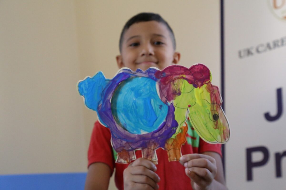 Palestinian child having fun during Interpal’s Eid Al Adha distributions, Lebanon