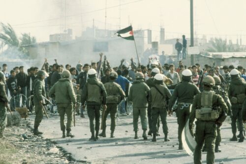 Palestinian protestors confront Israeli troops in Gaza City, 1987, during the First Intifada [21 Dec 1987, Sharir Efi / Israel Press and Photo Agency (I.P.P.A.) / Dan Hadani collection, National Library of Israel / Wikimedia]