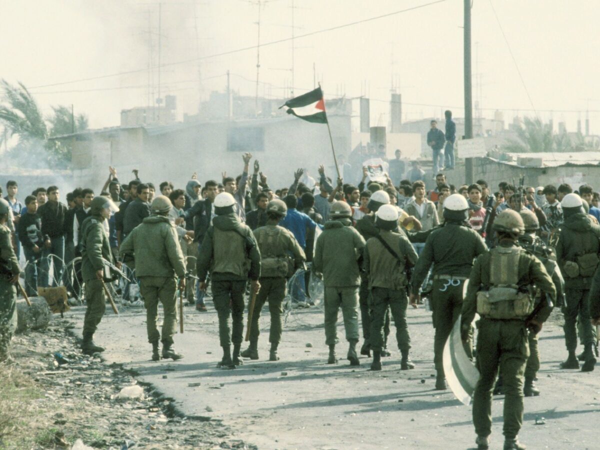 Palestinian protestors confront Israeli troops in Gaza City, 1987, during the First Intifada [21 Dec 1987, Sharir Efi / Israel Press and Photo Agency (I.P.P.A.) / Dan Hadani collection, National Library of Israel / Wikimedia]