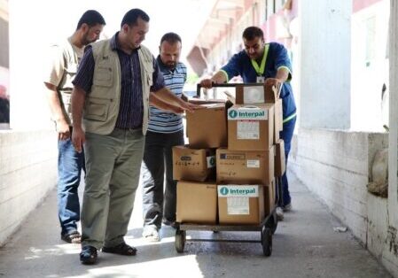 Interpal staff deliver vital medical aid to a Palestinian clinic